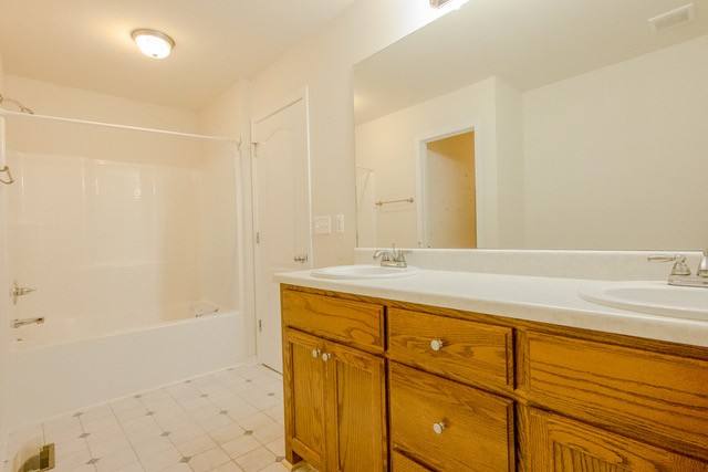 4272 J L Head Road Cedar Hill, TN 37032 - Photo 25 of 30 a bathroom with a sink and a mirror
