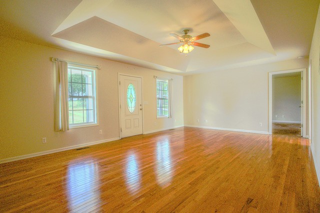 4272 J L Head Road Cedar Hill, TN 37032 - Photo 10 of 30 a view of an empty room with wooden floor and a window