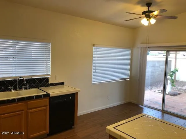 a kitchen that has a sink and a window