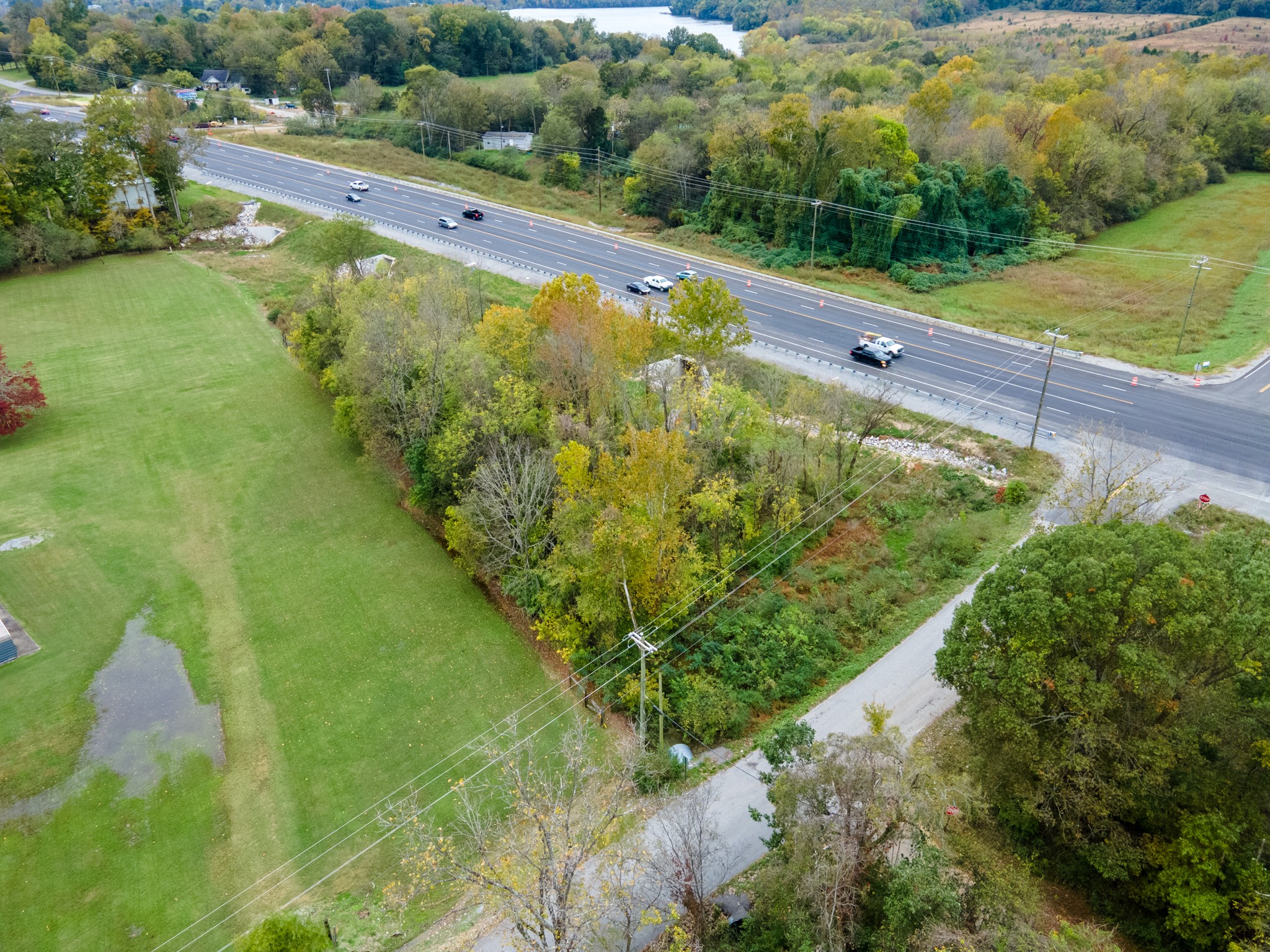 40 Northwest Williams Road Lebanon, TN 37087 - Photo 1 of 11 a view of a lake with a yard and mountain