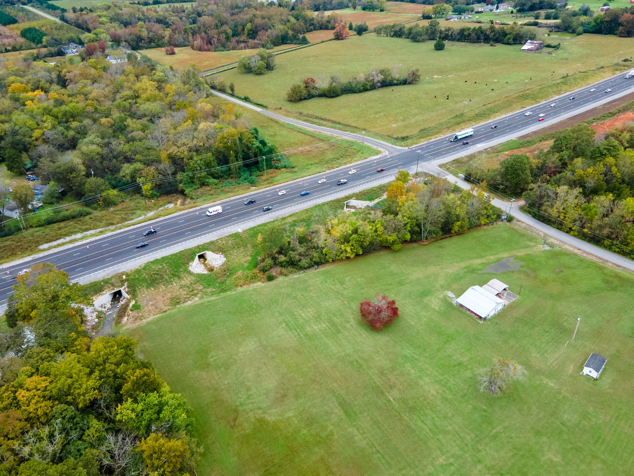 40 Northwest Williams Road Lebanon, TN 37087 - Photo 8 of 11 a view of a green yard with a swimming pool
