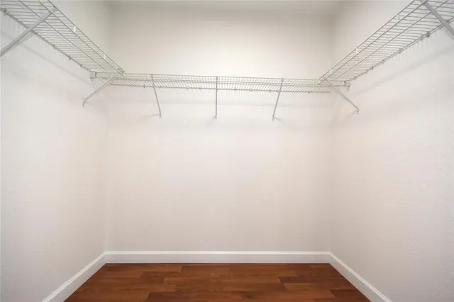 a view of a room with racks on the wall