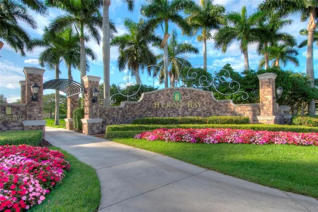 a view of a swimming pool and a chair