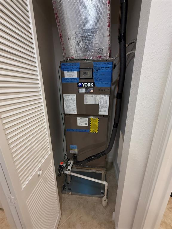 8297 Northwest 128th Lane, Unit 20C Parkland, FL 33076 - Photo 32 of 42 a view of a hallway with workspace and windows