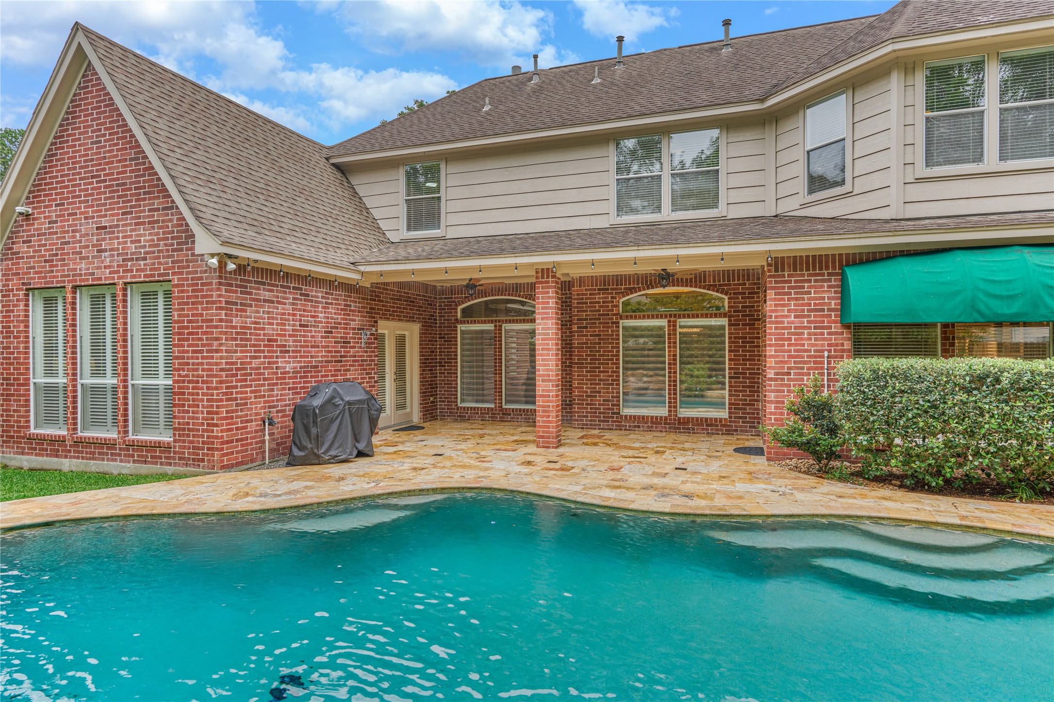7 Gentry Oak Court Spring, TX 77381 - Photo 46 of 50 a view of a house with a patio
