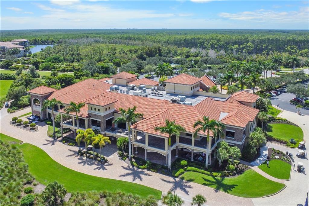 9578 Trevi Court, Unit 5135 Naples, FL 34113 - Photo 27 of 31 an aerial view of multiple house