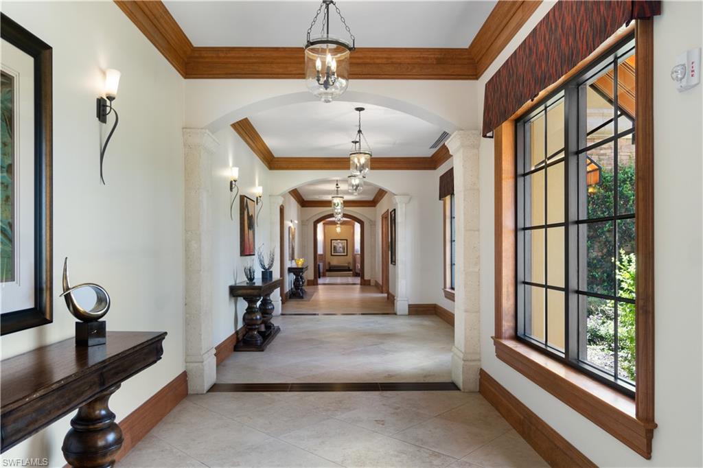 9578 Trevi Court, Unit 5135 Naples, FL 34113 - Photo 28 of 31 a view of a room with gym equipment