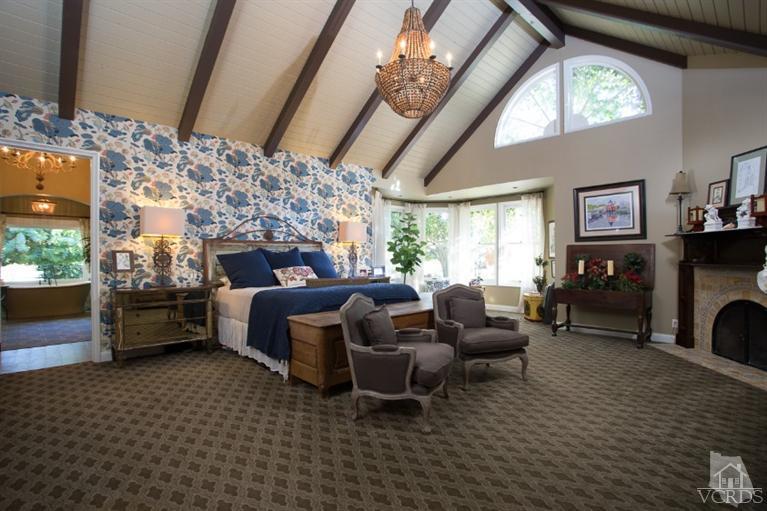 2748 Los Pinos Circle Camarillo, CA 93012 - Photo 15 of 37 a living room with furniture a fireplace and a flat screen tv