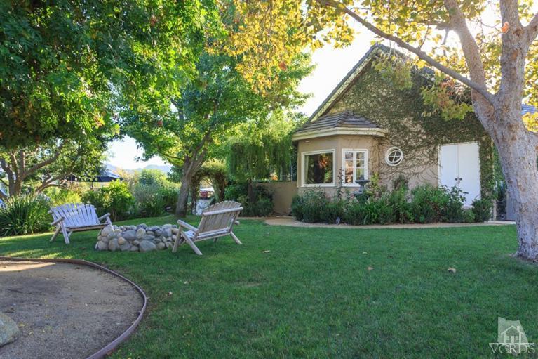 2748 Los Pinos Circle Camarillo, CA 93012 - Photo 25 of 37 a view of a house with backyard sitting area and garden