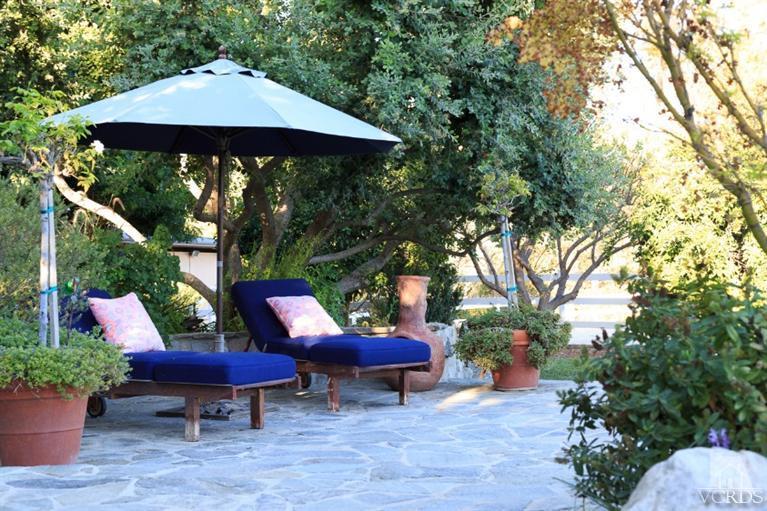 2748 Los Pinos Circle Camarillo, CA 93012 - Photo 33 of 37 a view of a table and chairs under an umbrella in backyard