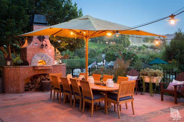 2748 Los Pinos Circle Camarillo, CA 93012 - Photo 35 of 37 an outdoor space with furniture and umbrella