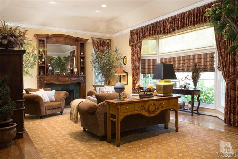 2748 Los Pinos Circle Camarillo, CA 93012 - Photo 5 of 37 a living room with fireplace furniture and a large window