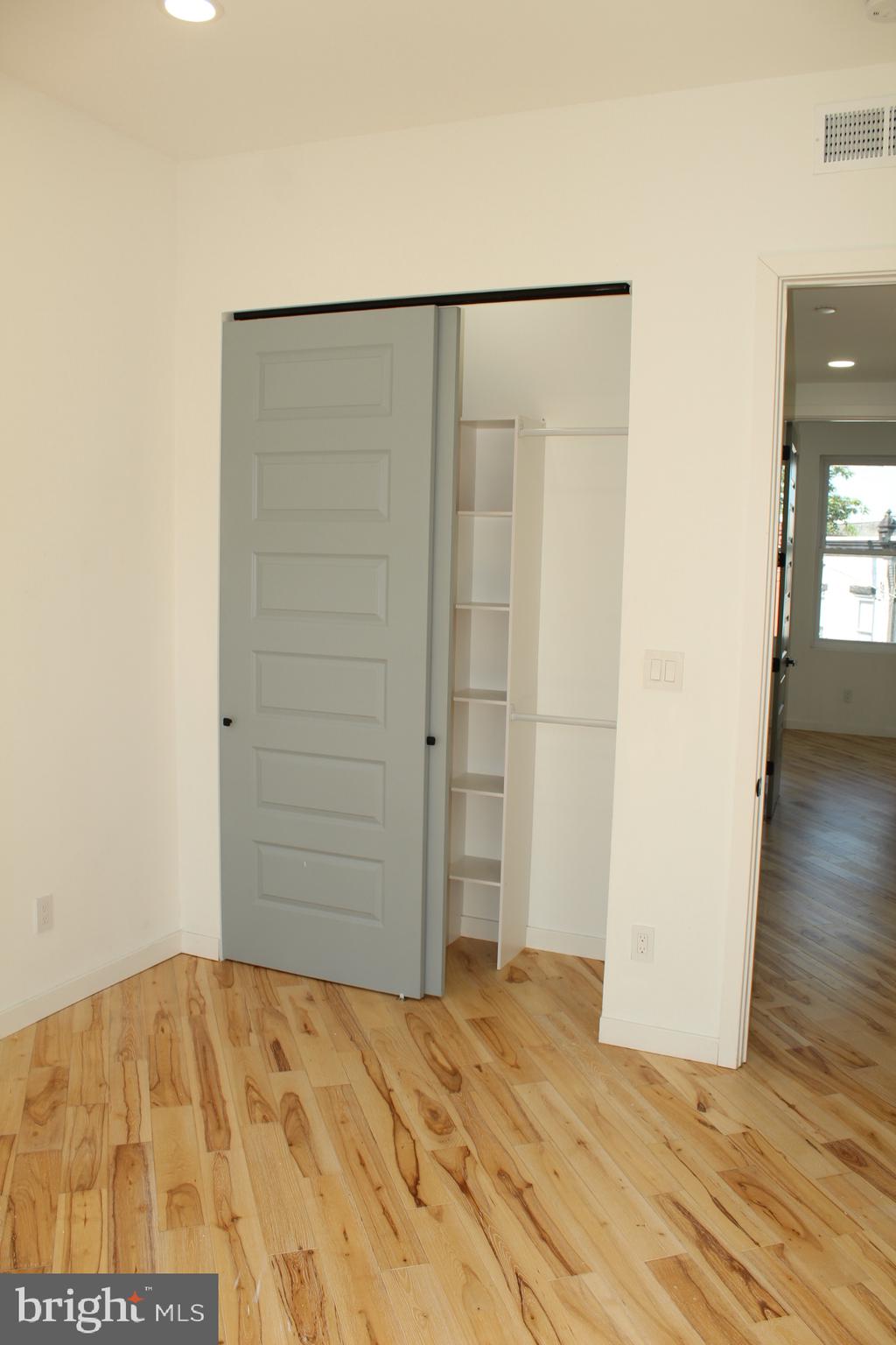 3017 Ridge Avenue, Unit C Philadelphia, PA 19121 - Photo 12 of 27 Sleek sliding door reveals hidden space.