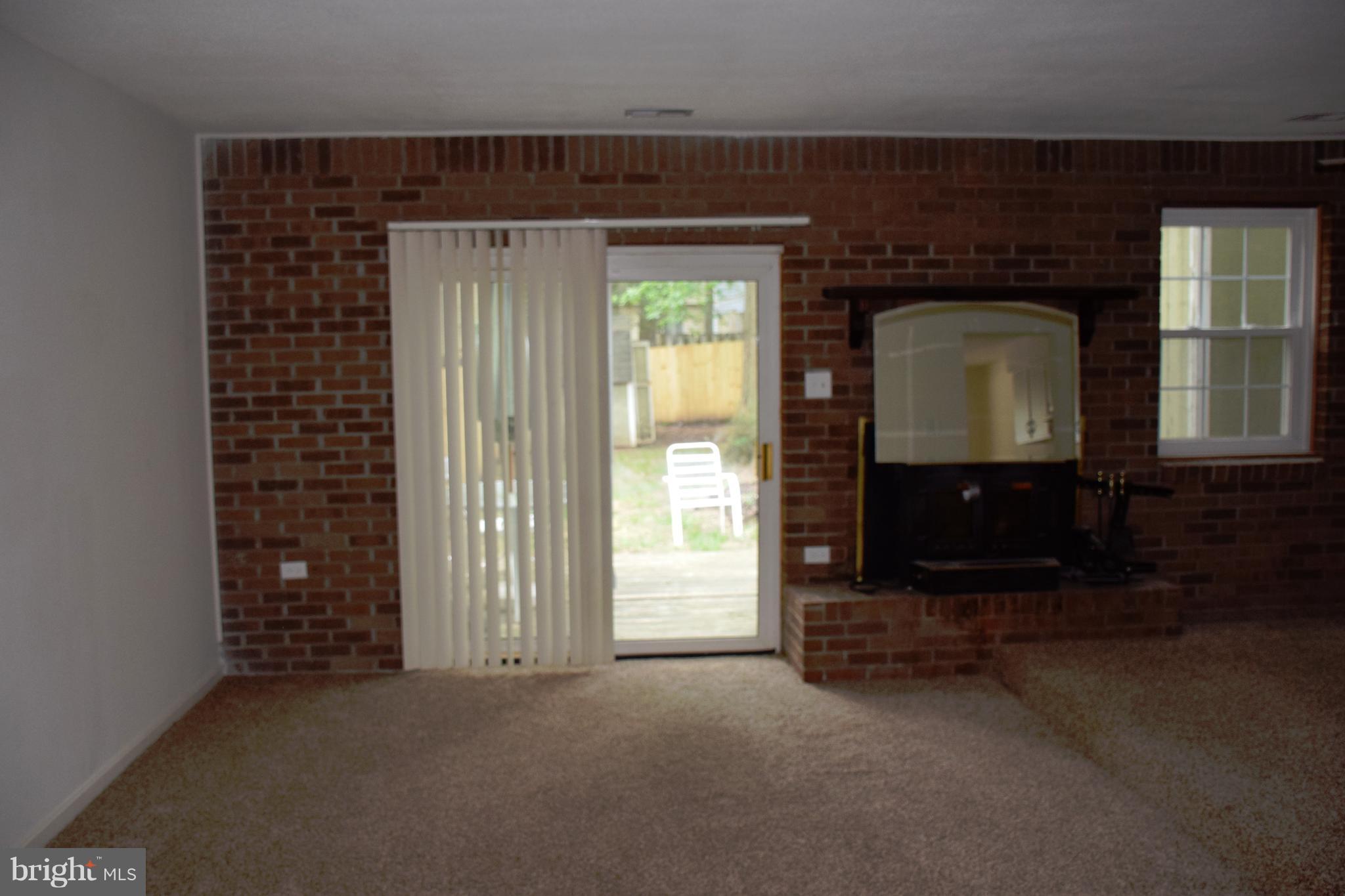 3366 Ryon Court Waldorf, MD 20601 - Photo 10 of 19 LIVING ROOM HAS SLIDER TO FENCED IN BACK YARD