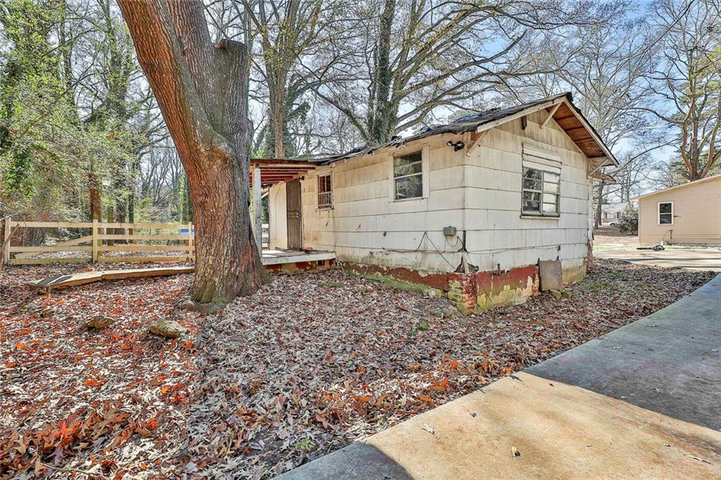 66 Howell Drive Southwest Atlanta, GA 30331 - Photo 27 of 27 a view of a house with a yard
