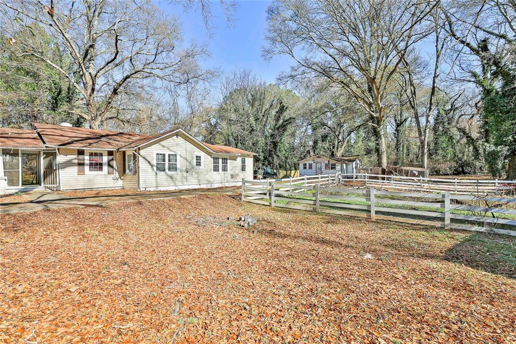 66 Howell Drive Southwest Atlanta, GA 30331 - Photo 3 of 27 a house view with a outdoor space