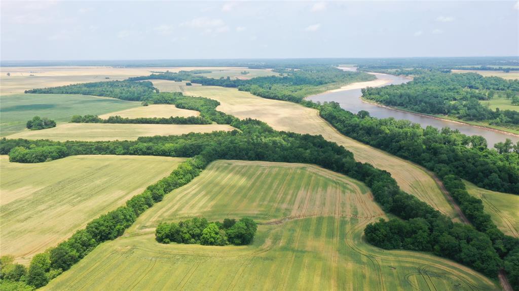 36980 Rd Arthur City Tx 75411 Road Arthur City, TX 75411 - Photo 13 of 23 an aerial view of residential houses with outdoor space