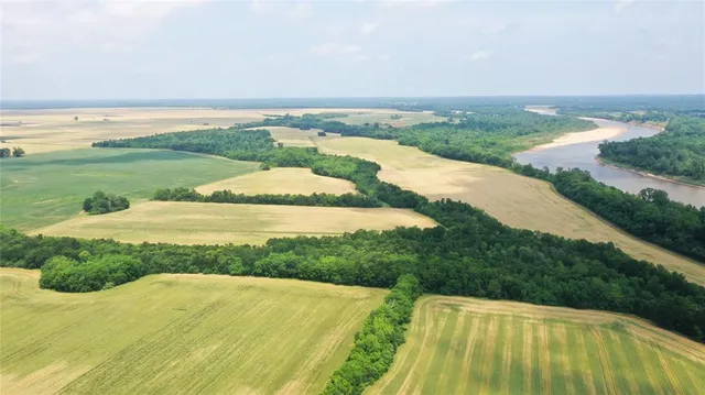 a view of a lake with a yard