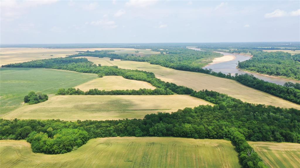 36980 Rd Arthur City Tx 75411 Road Arthur City, TX 75411 - Photo 18 of 23 an aerial view of ocean with residential house and outdoor space