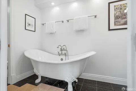 a view of a bathroom from the hallway