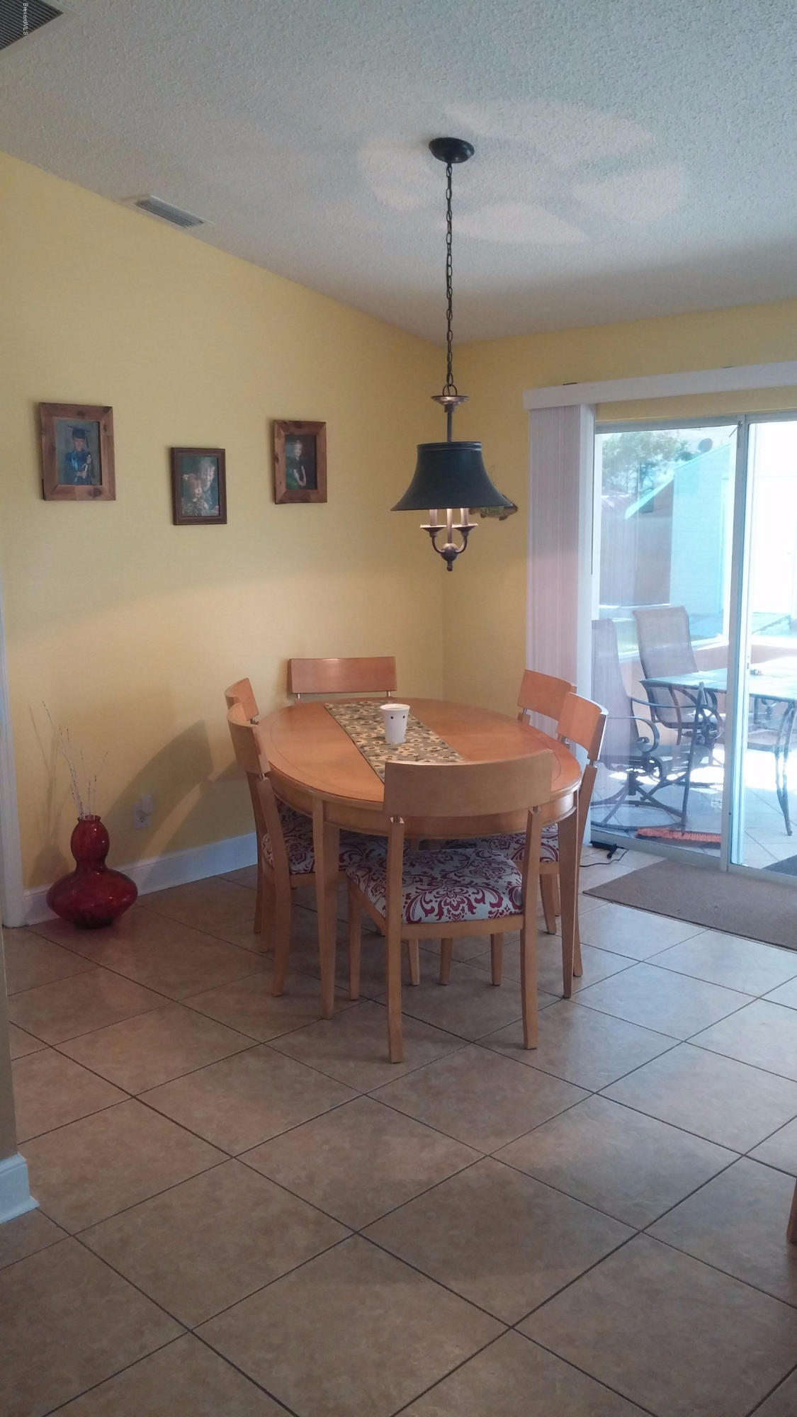 6950 Bryant Road Cocoa, FL 32927 - Photo 7 of 20 a view of a livingroom with furniture and window