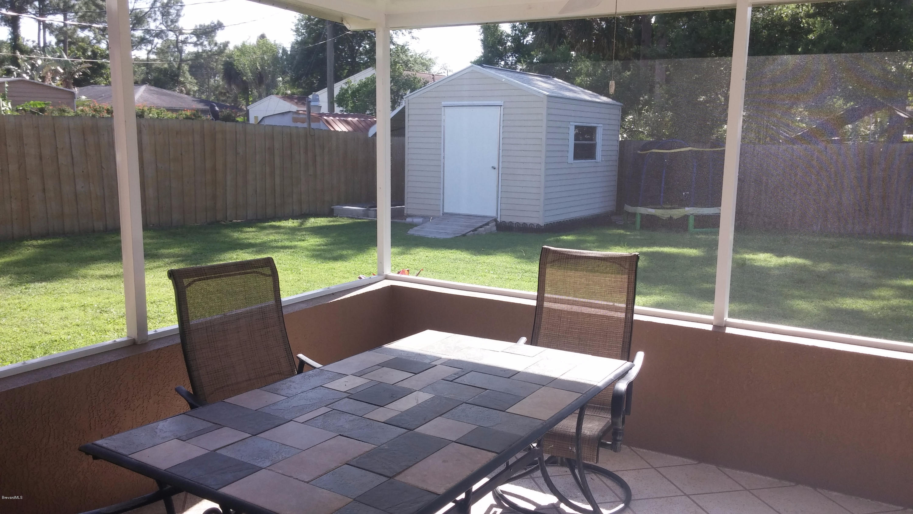 6950 Bryant Road Cocoa, FL 32927 - Photo 8 of 20 a balcony view with a seating space