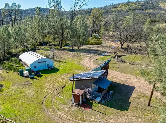 a view of a back yard of the house