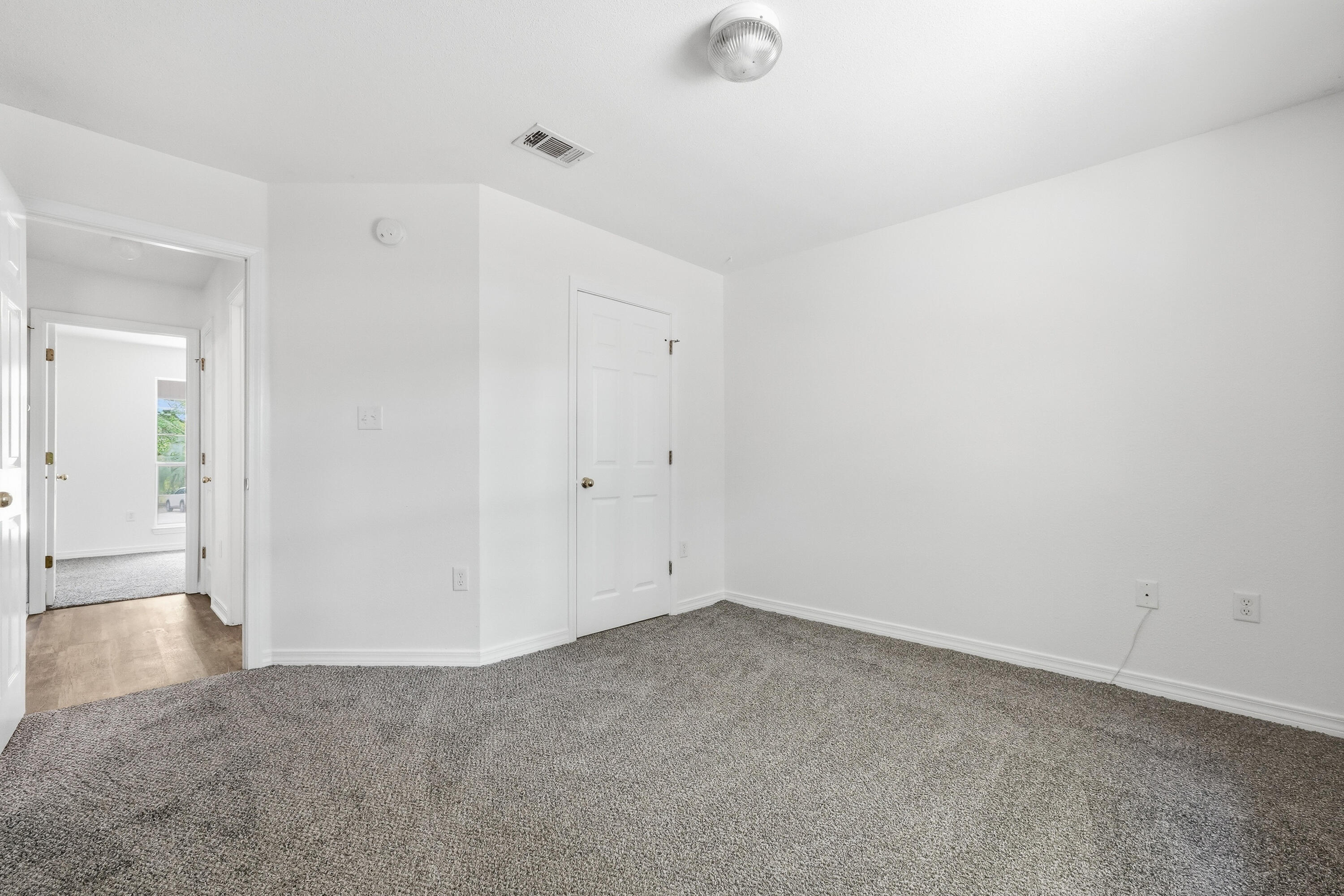 4087 Audiss Road Milton, FL 32583 - Photo 29 of 34 wooden floor in an empty room