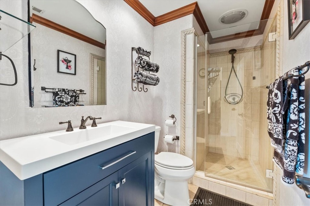 1506 Bergman Court Brea, CA 92821 - Photo 14 of 29 a bathroom with a sink vanity mirror and shower