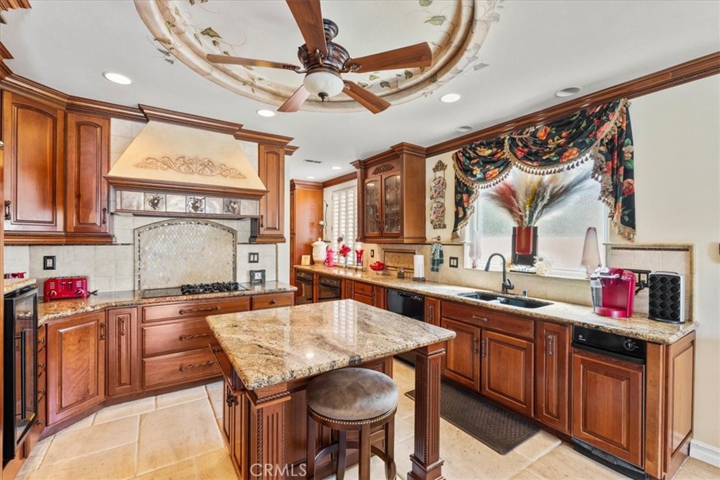 1506 Bergman Court Brea, CA 92821 - Photo 10 of 29 a kitchen with a stove a refrigerator and a wooden cabinets