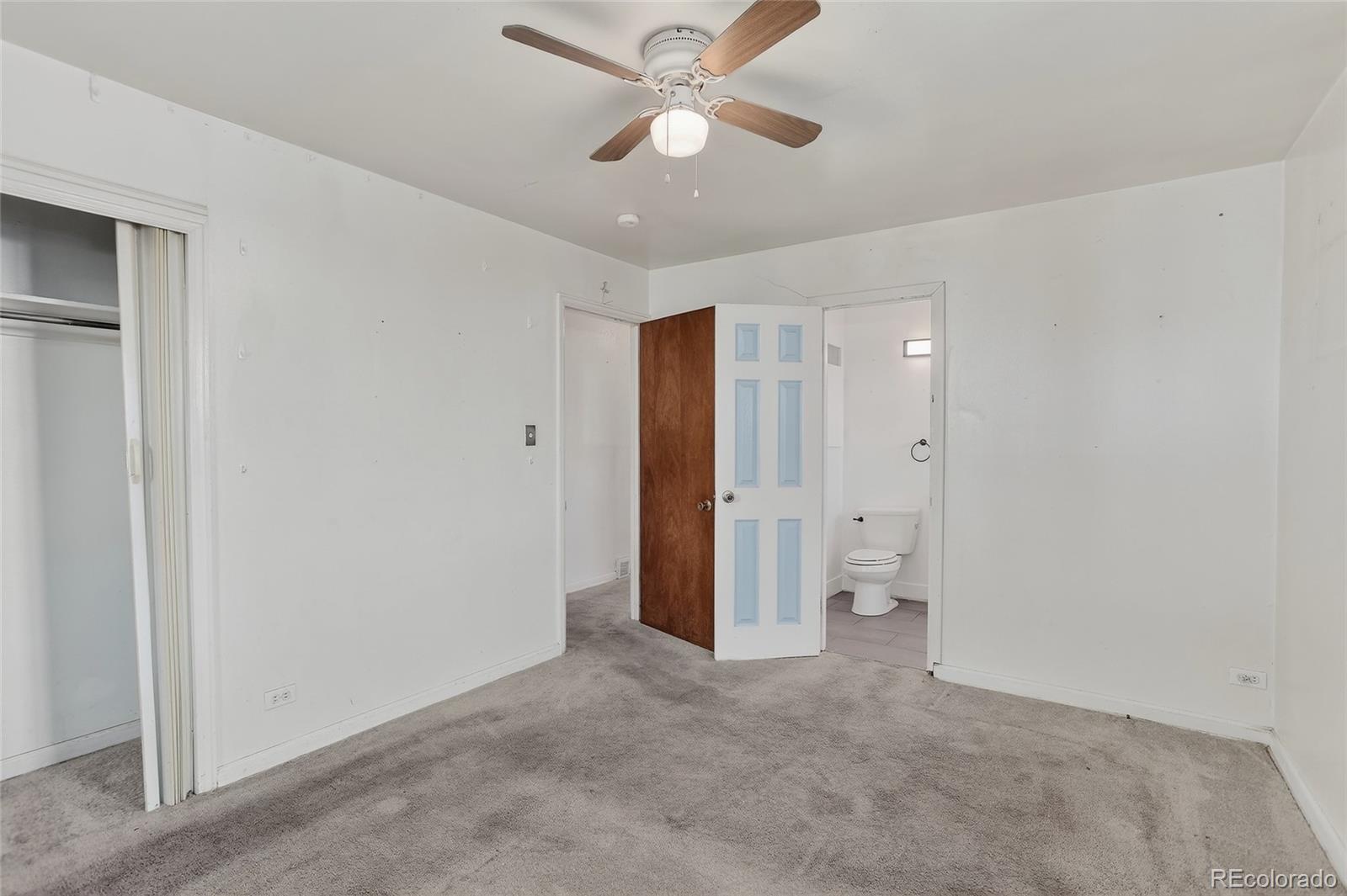 1279 South Raritan Street Denver, CO 80223 - Photo 15 of 21 a view of empty room with a ceiling fan