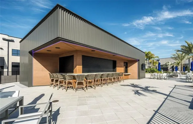 a view of a swimming pool with a lounge chairs