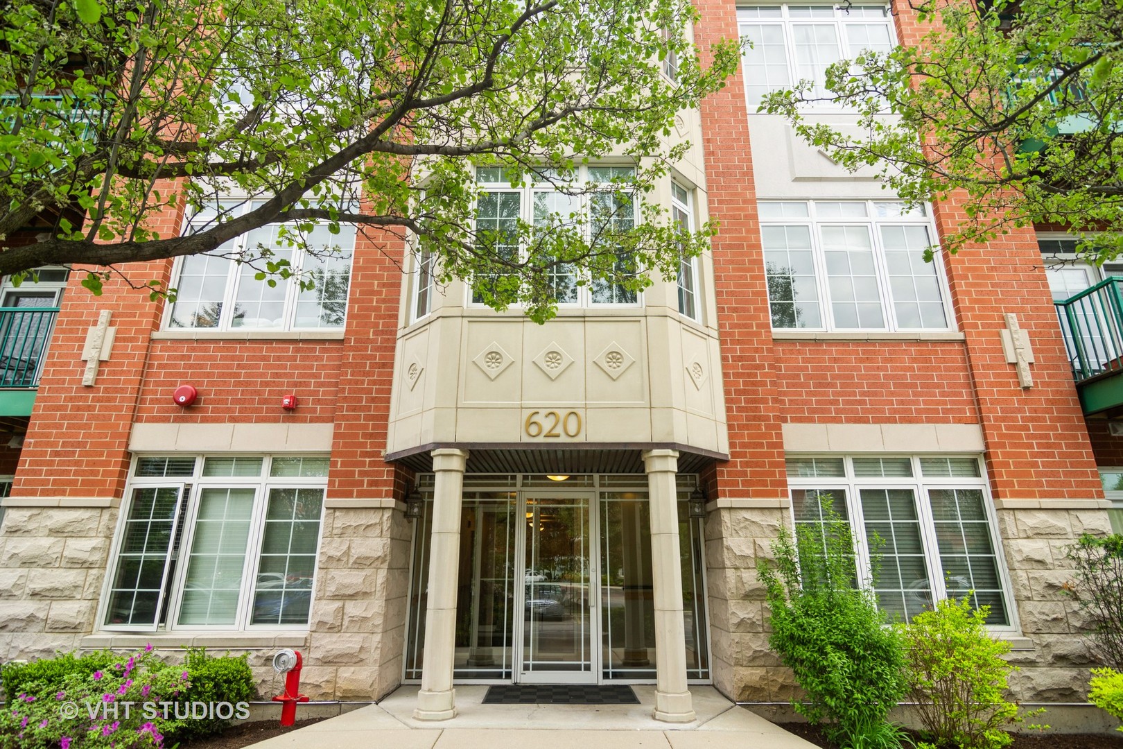 620 McHenry Road, Unit 201 Wheeling, IL 60090 - Photo 1 of 22 front view of a building