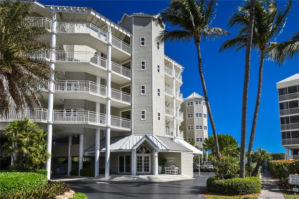 579 Northeast Plantation Road, Unit N202 Jensen Beach, FL 34957 - Photo 12 of 42 a front view of a multi story building