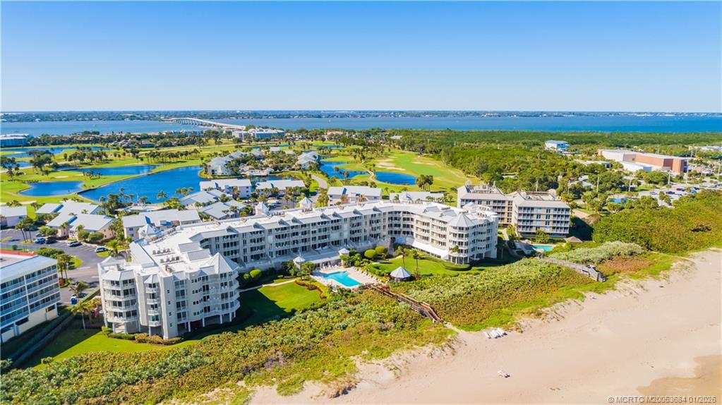 579 Northeast Plantation Road, Unit N202 Jensen Beach, FL 34957 - Photo 7 of 42 a view of an ocean with city