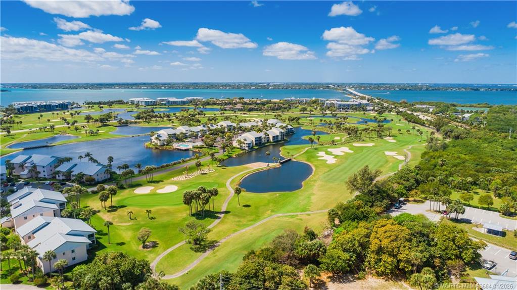 579 Northeast Plantation Road, Unit N202 Jensen Beach, FL 34957 - Photo 10 of 42 a view of a lake in front of house with outdoor space