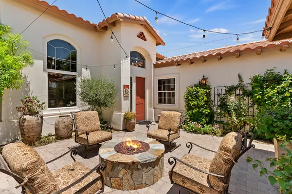 a building outdoor space with patio furniture