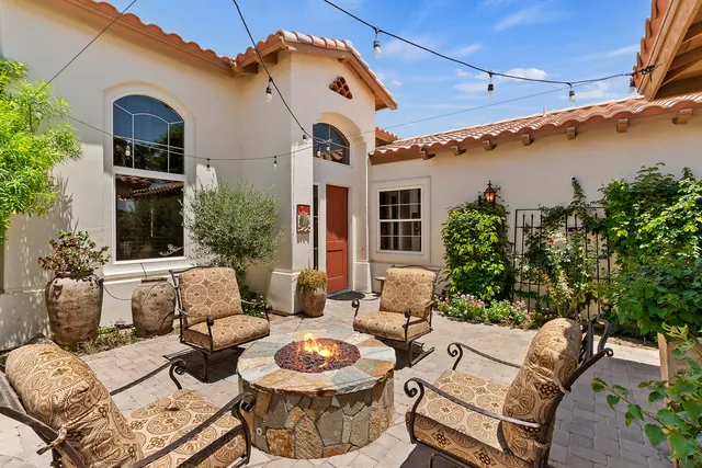 a building outdoor space with patio furniture