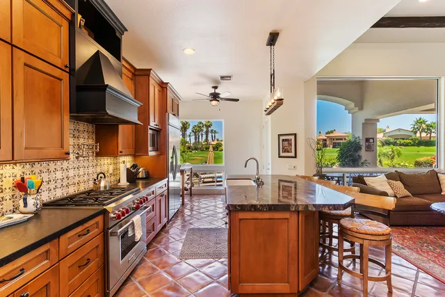 a very nice looking dining room with a large window