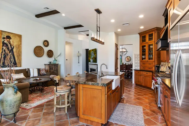 a very nice looking living room with furniture and a rug