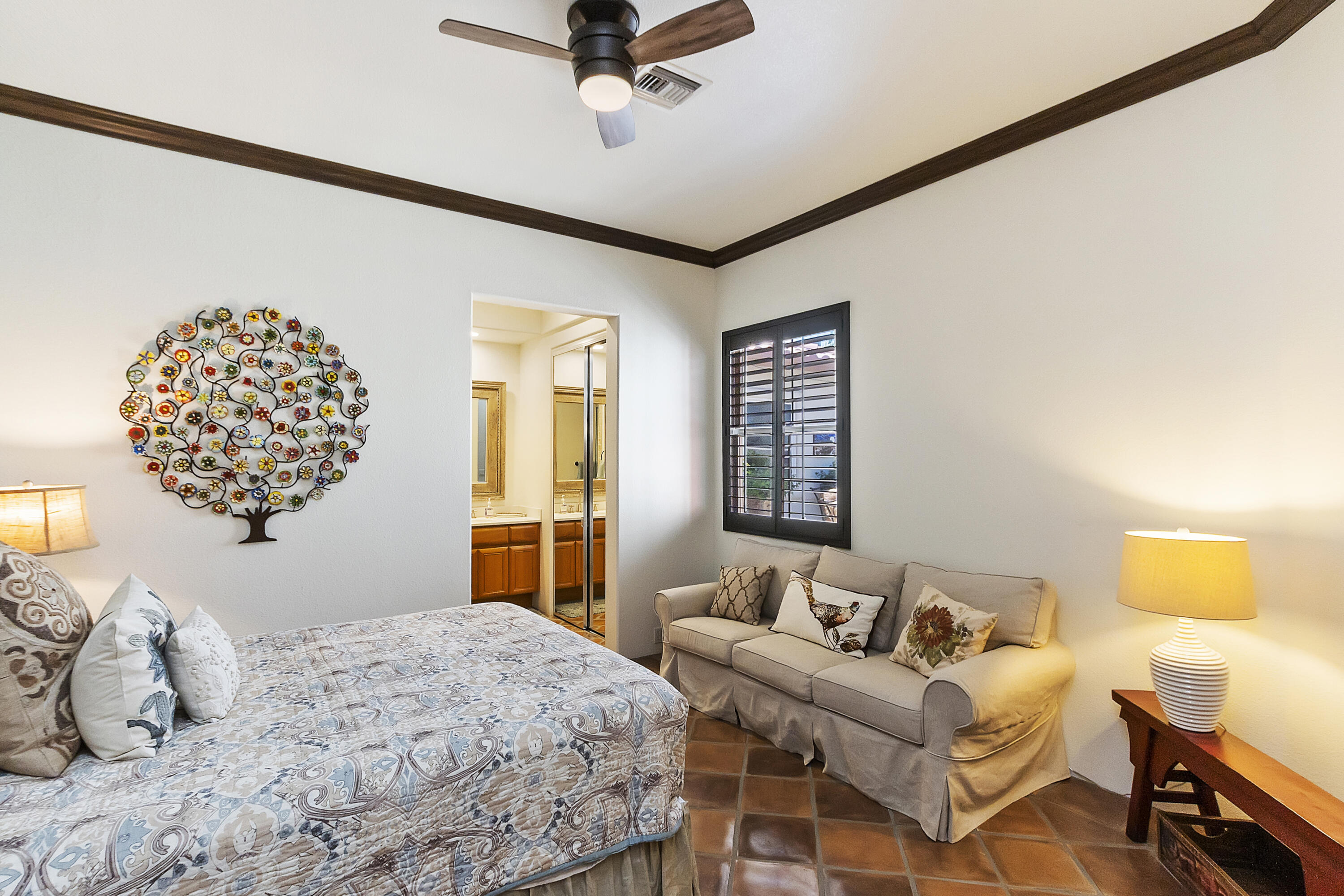 78920 Cabrillo Way La Quinta, CA 92253 - Photo 21 of 41 a bedroom with a bed and wooden floor