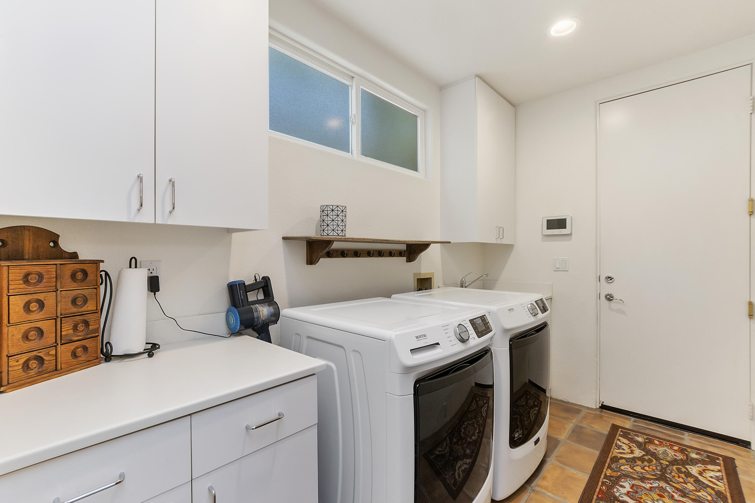 78920 Cabrillo Way La Quinta, CA 92253 - Photo 24 of 41 a utility room with dryer and washer