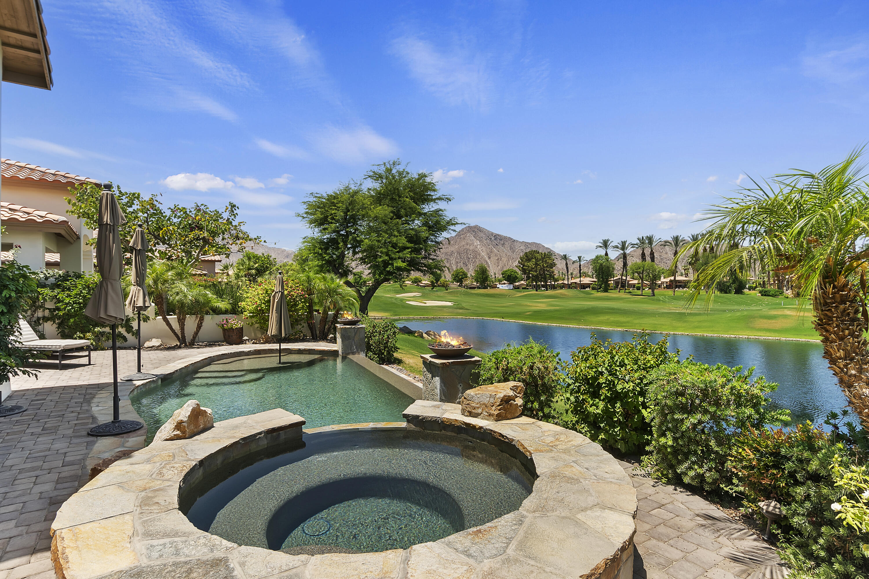 78920 Cabrillo Way La Quinta, CA 92253 - Photo 27 of 41 a view of a swimming pool with a lake view