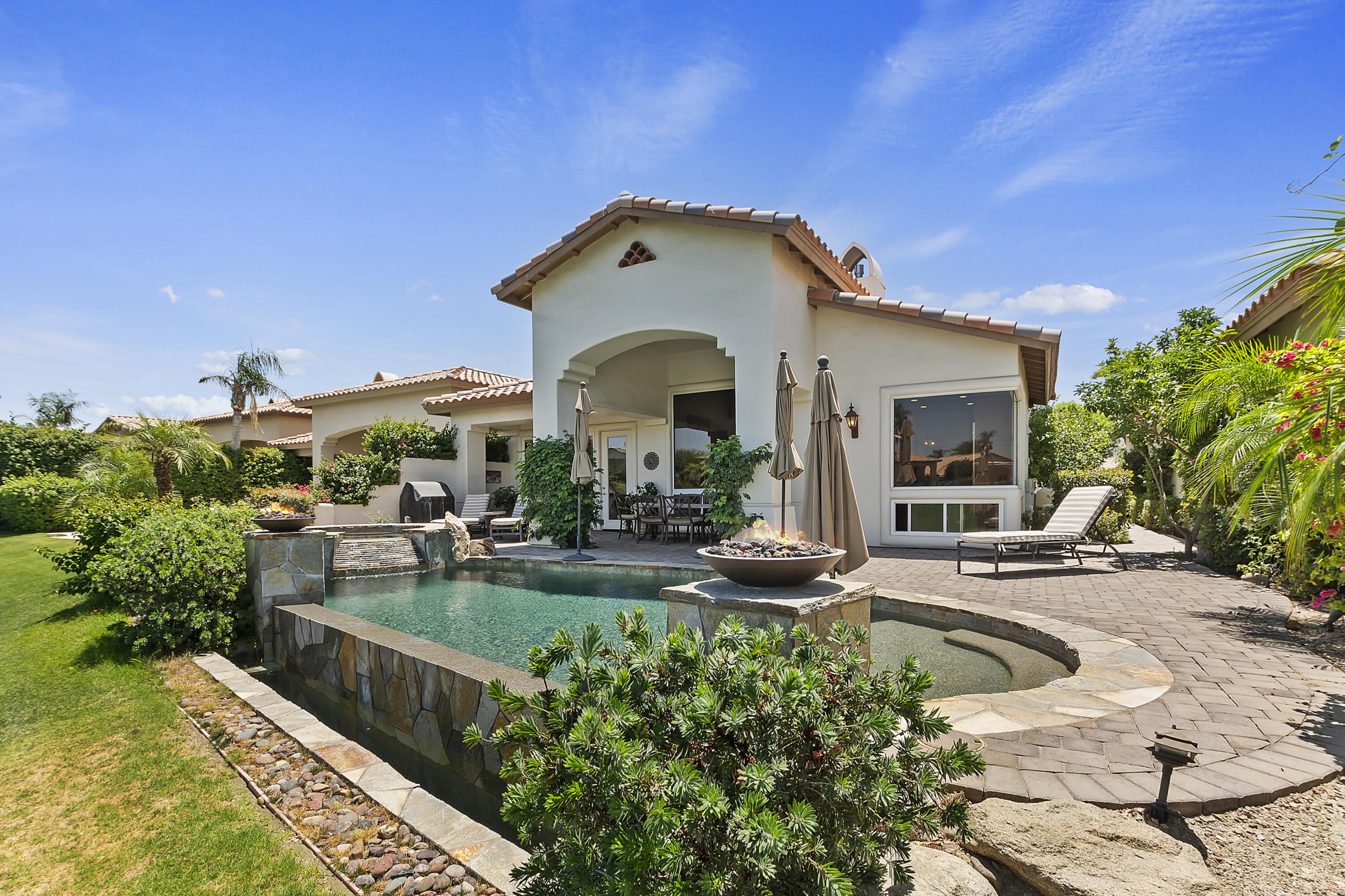 78920 Cabrillo Way La Quinta, CA 92253 - Photo 29 of 41 a view of a house with swimming pool and sitting area