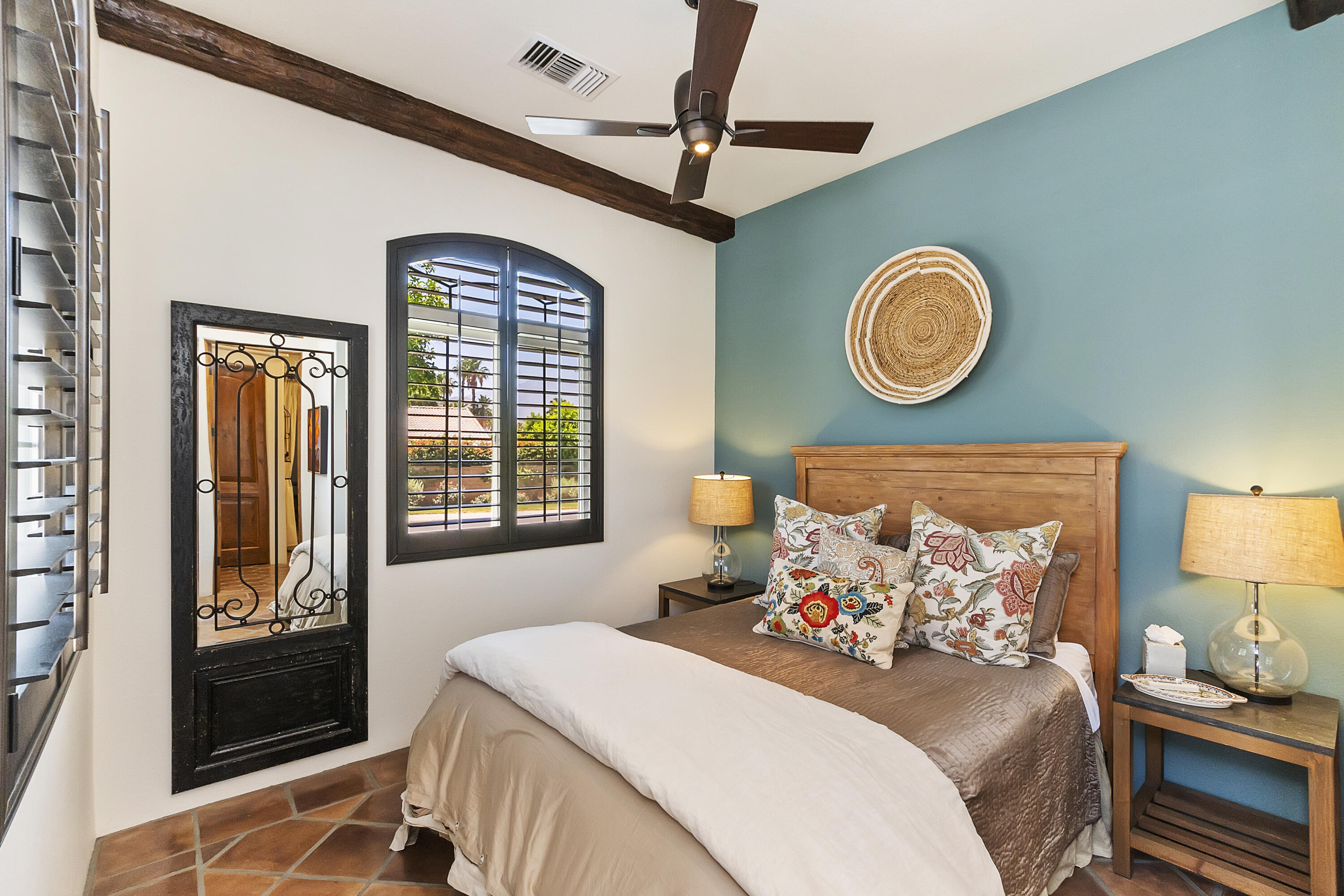 78920 Cabrillo Way La Quinta, CA 92253 - Photo 37 of 41 a bedroom with a bed and a window