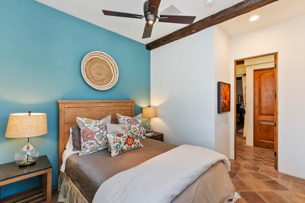 a bathroom with a shower sink and mirror