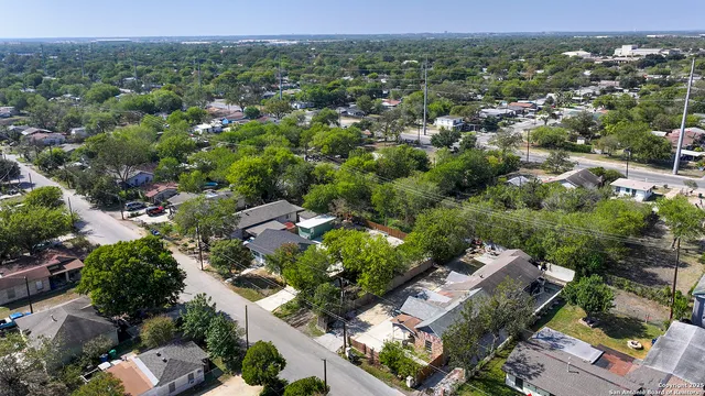 an aerial view of a city with lots of residential buildings