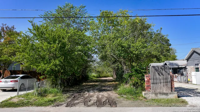a view of a house with a street