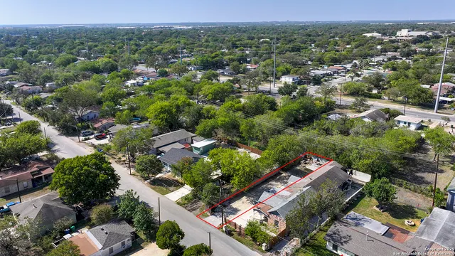 an aerial view of a city with lots of residential buildings