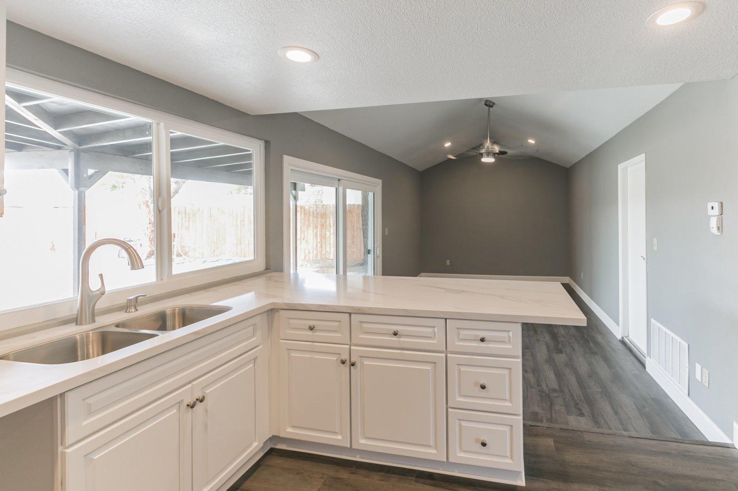 441 Debra Lane Ridgecrest, CA 93555 - Photo 11 of 30 a kitchen with cabinets a sink and appliances